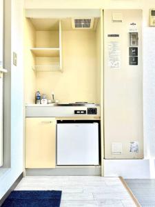 Cuina o zona de cuina de 201号室花園町,萩之茶屋駅步行2分専用バスルームアクセス便利