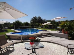 Bazén v ubytování Hotel Boutique Casa Bella nebo v jeho okolí