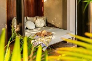 Letto o letti in una camera di Palm Hotel & Spa