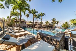 una foto della piscina del resort di Palm Hotel & Spa a Petite-Île