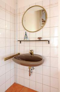 Ein Badezimmer in der Unterkunft Ferienwohnungen Haus Taddigshus