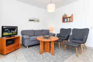 TV/Unterhaltungsangebot in der Unterkunft Ferienwohnungen Haus Taddigshus