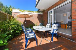Ein Patio oder anderer Außenbereich in der Unterkunft Ferienwohnungen Haus Taddigshus