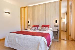 Voodi või voodid majutusasutuse Hotel Eth Solan & SPA toas