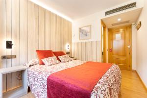 Voodi või voodid majutusasutuse Hotel Eth Solan & SPA toas