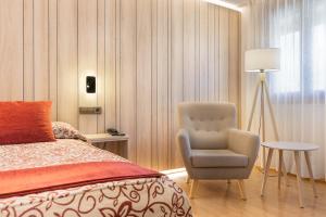 Voodi või voodid majutusasutuse Hotel Eth Solan & SPA toas