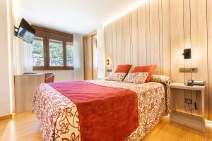 Voodi või voodid majutusasutuse Hotel Eth Solan & SPA toas