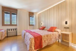 Voodi või voodid majutusasutuse Hotel Eth Solan & SPA toas
