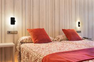 Voodi või voodid majutusasutuse Hotel Eth Solan & SPA toas