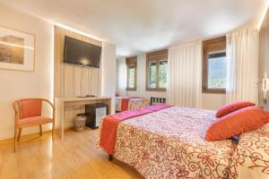 Voodi või voodid majutusasutuse Hotel Eth Solan & SPA toas