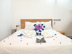 Letto o letti in una camera di Olhumathi View Inn