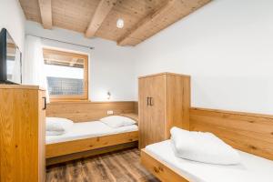 Posteľ alebo postele v izbe v ubytovaní Hotel Pfeiferhof
