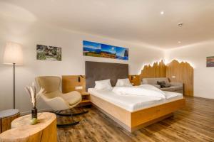 Posteľ alebo postele v izbe v ubytovaní Hotel Pfeiferhof
