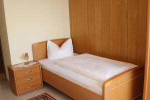 Ένα ή περισσότερα κρεβάτια σε δωμάτιο στο Hotel Restaurant Gilles