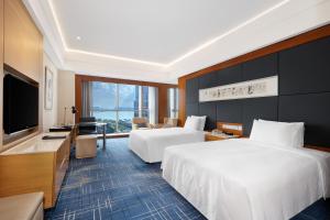 Postel nebo postele na pokoji v ubytování Four Points by Sheraton Suzhou