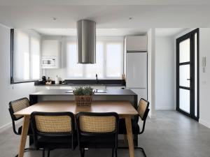 Kuchyň nebo kuchyňský kout v ubytování Apartamentos Clotilde