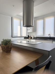 Kuchyň nebo kuchyňský kout v ubytování Apartamentos Clotilde
