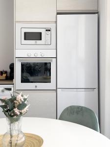 Kuchyň nebo kuchyňský kout v ubytování Apartamentos Clotilde