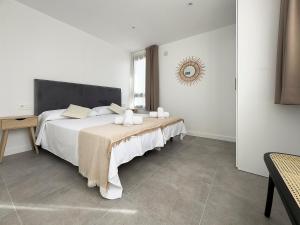 Postel nebo postele na pokoji v ubytování Apartamentos Clotilde