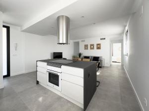 Kuchyň nebo kuchyňský kout v ubytování Apartamentos Clotilde