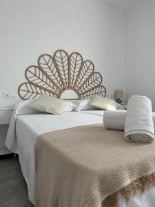 Postel nebo postele na pokoji v ubytování Apartamentos Clotilde