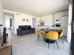 Kuchyň nebo kuchyňský kout v ubytování Apartamentos Clotilde