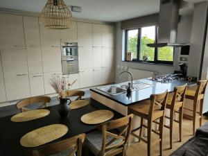Kuchyň nebo kuchyňský kout v ubytování Vakantiewoning De Zilverberk