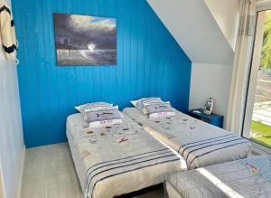 Postel nebo postele na pokoji v ubytování La Villa KEROMER