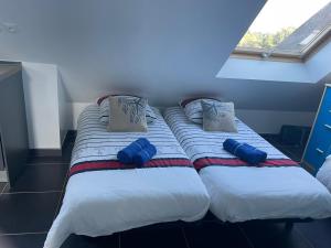 Postel nebo postele na pokoji v ubytování La Villa KEROMER