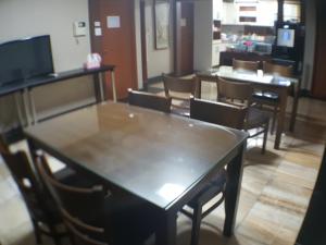 TV a/nebo společenská místnost v ubytování Plus Motel