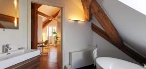 Postel nebo postele na pokoji v ubytování Exklusive Penthouse Wohnung, nahe zur Schweiz
