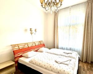 Voodi või voodid majutusasutuse Apartments Valencia toas