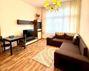 Televiisor ja/või meelelahutuskeskus majutusasutuses Apartments Valencia