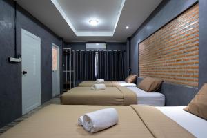 Letto o letti in una camera di Mango tree อ่าวมะขามป้อม