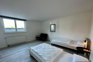 Postel nebo postele na pokoji v ubytování Ferienwohnung Hannah nahe Freiburg
