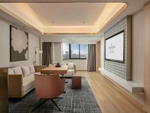 Posezení v ubytování Country Inn & Suite by Radisson, Guangzhou Railway Station Xiaobei