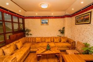 Un lugar para sentarse en Hotel Aashraya Home
