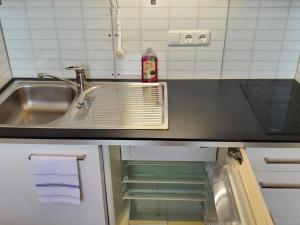 Kuchyň nebo kuchyňský kout v ubytování Apartmenthaus Salzburger Hof + 103 fotografií