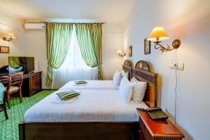 Letto o letti in una camera di Hotel Classico Timisoara