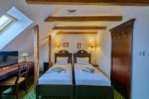 Letto o letti in una camera di Hotel Classico Timisoara