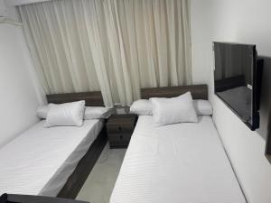 Ένα ή περισσότερα κρεβάτια σε δωμάτιο στο villa 17