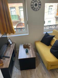 Ruang duduk di Appartements Avesnes sur Helpe Cosy T2