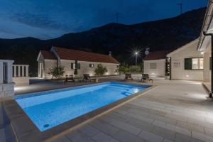 Bazén v ubytování Villa Smokva and Višnja - Resort Moja Stina nebo v jeho okolí + 55 fotografií