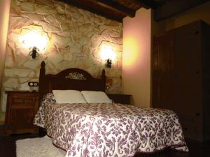 A bed or beds in a room at El Rincon Del Villar