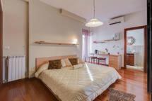 a bedroom with a large bed in a room at B&B La Terrazza in Rome