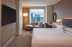 Postel nebo postele na pokoji v ubytování Hyatt Regency Seattle