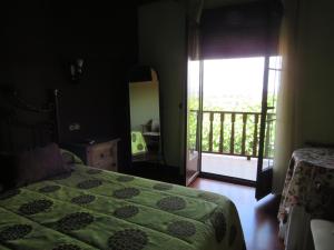 A bed or beds in a room at El Rincon Del Villar