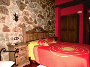 A bed or beds in a room at El Rincon Del Villar