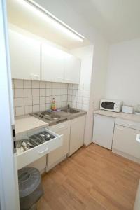 Una cocina o cocineta en BNB Potsdamer Platz Rooms & Apartments