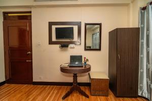 Μια τηλεόραση ή/και κέντρο ψυχαγωγίας στο Karma Travellers Home